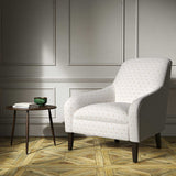 A white woven fabric on an armchair.