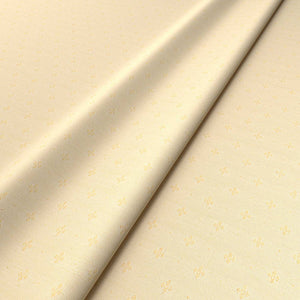 Sample of a gold woven fabric.