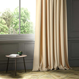 A gold woven fabric shown as a curtain.