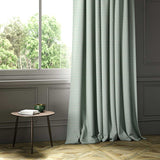 A blue woven fabric shown as a curtain.