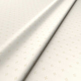 Sample of a white woven fabric.