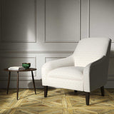 A white woven fabric on an armchair.