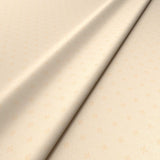 Sample of a cream woven fabric.