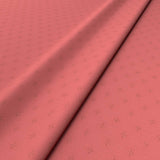 Sample of a pink woven fabric.