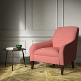 A pink woven fabric on an armchair.