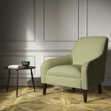 A green woven fabric on an armchair.