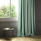A blue woven fabric shown as a curtain.
