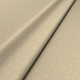 Sample of a cream woven fabric.