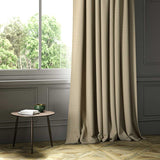A cream woven fabric shown as a curtain.