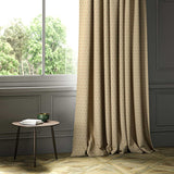 A cream woven fabric shown as a curtain.