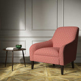 A pink woven fabric on an armchair.