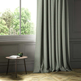 A blue woven fabric shown as a curtain.