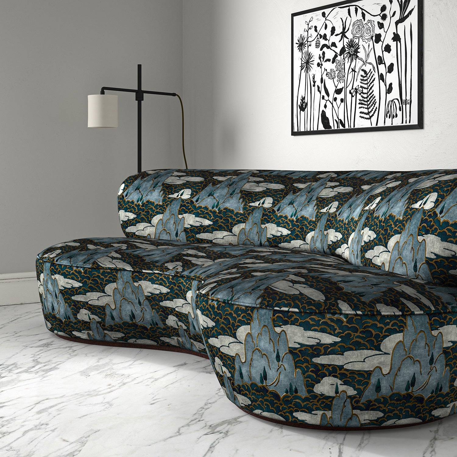 Velvet sofa upholstered in a printed velvet fabric with a scenic landscape design in blue colours.