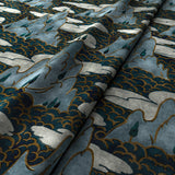 Printed velvet fabric with a scenic landscape oriental design in blue colours, for upholstery and curtain use.
