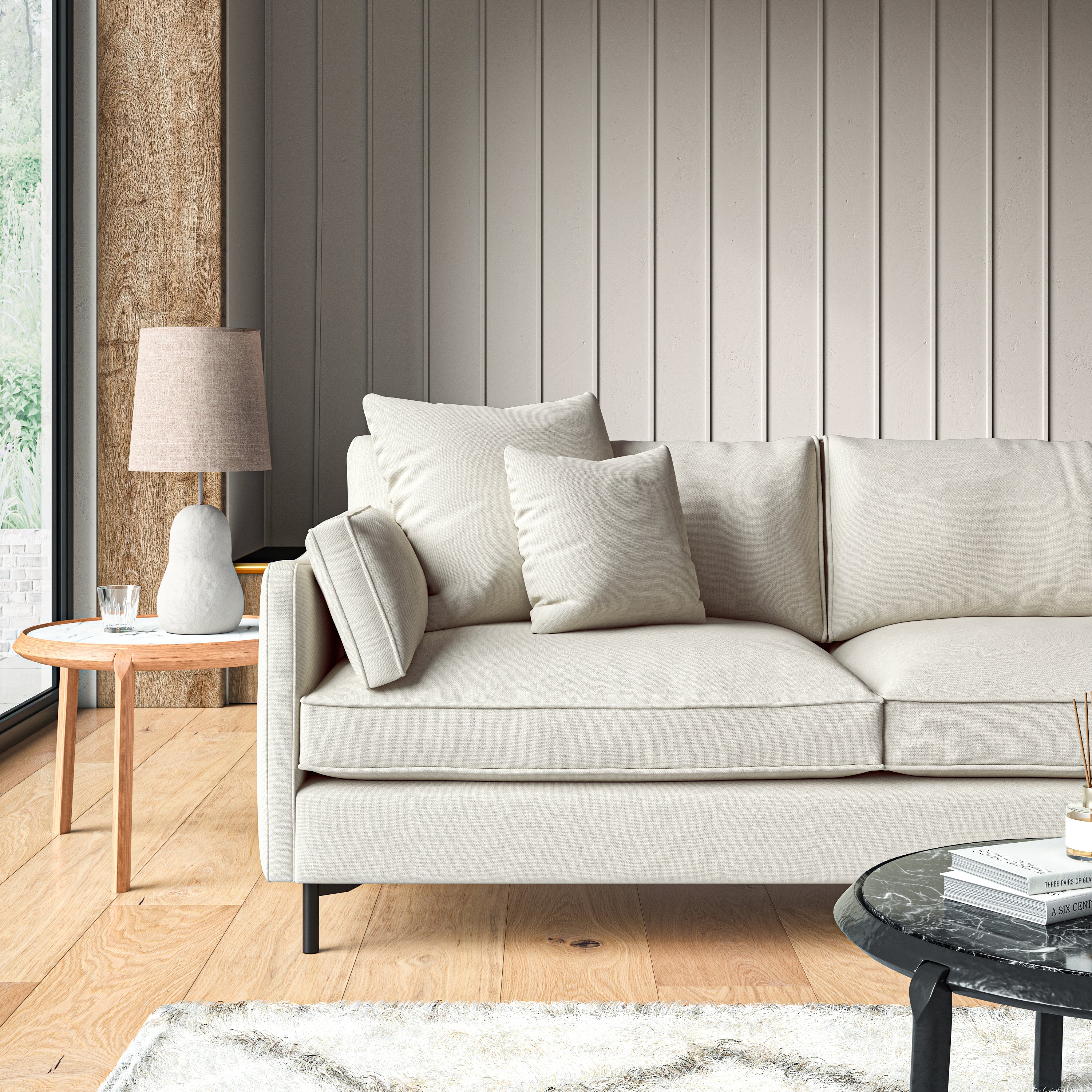 Sofa upholstered in Dove linen fabric