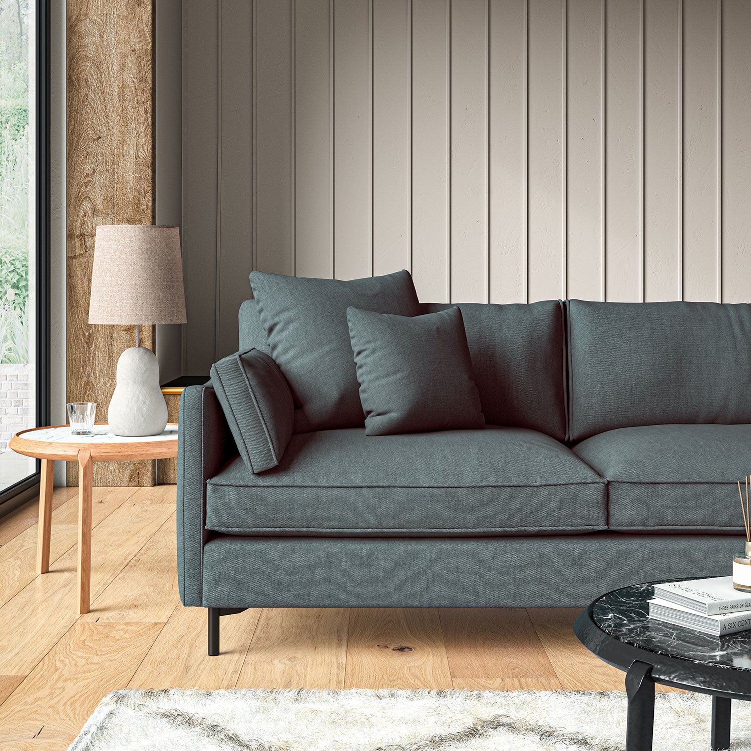 Sofa upholstered in Slate linen fabric