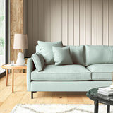 Sofa upholstered in Sky linen fabric