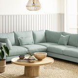 Sofa upholstered in Sky linen fabric