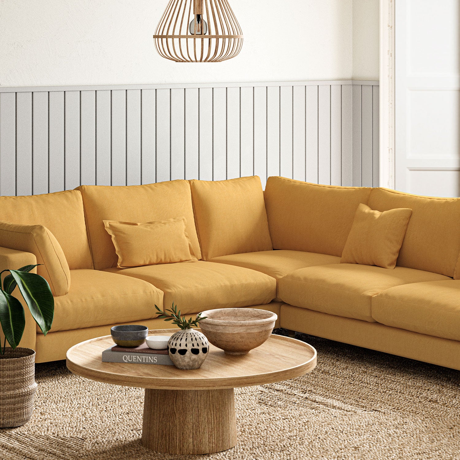 Sofa upholstered in Maize linen fabric