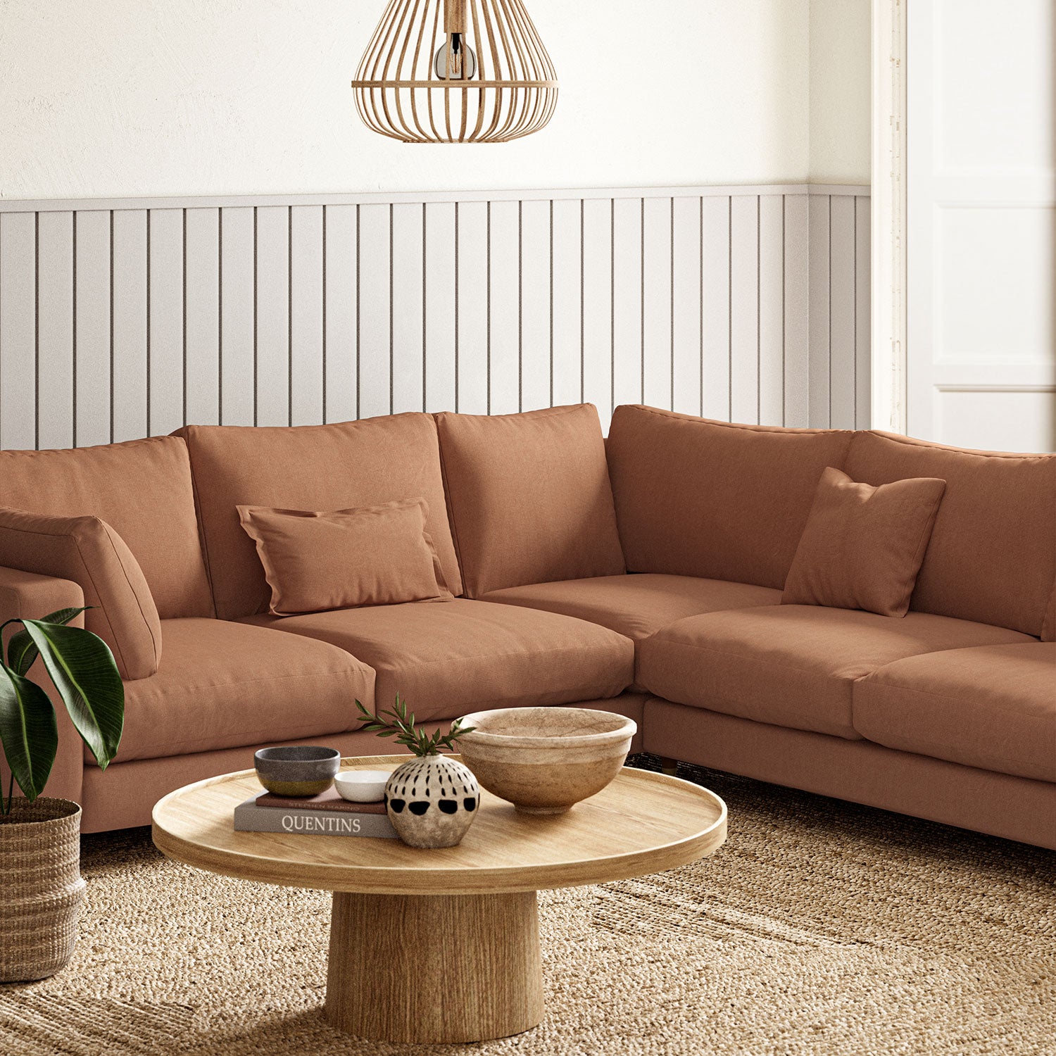 Sofa upholstered in Spice linen fabric