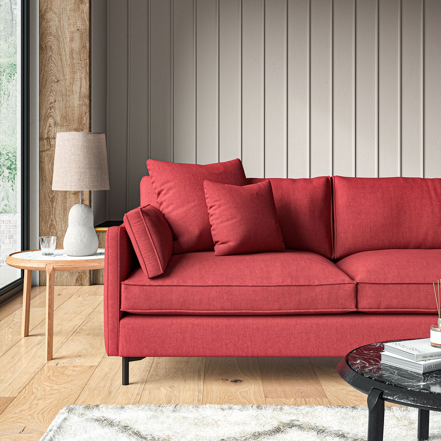 Sofa upholstered in Lipstick linen fabric
