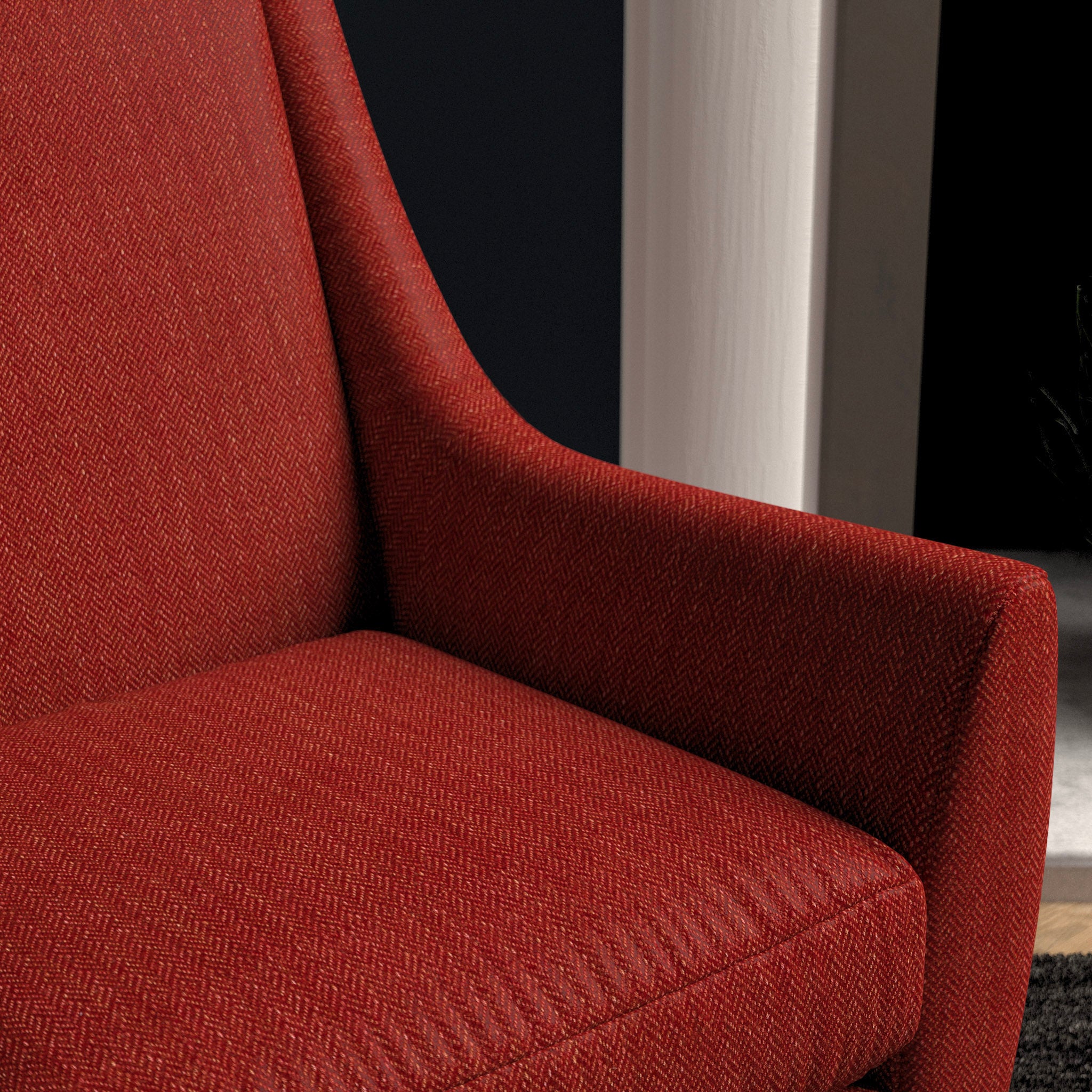 Chair upholstered in a bright red herringbone wool weave upholstery fabric