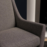 Chair upholstered in a purple herringbone wool weave upholstery fabric
