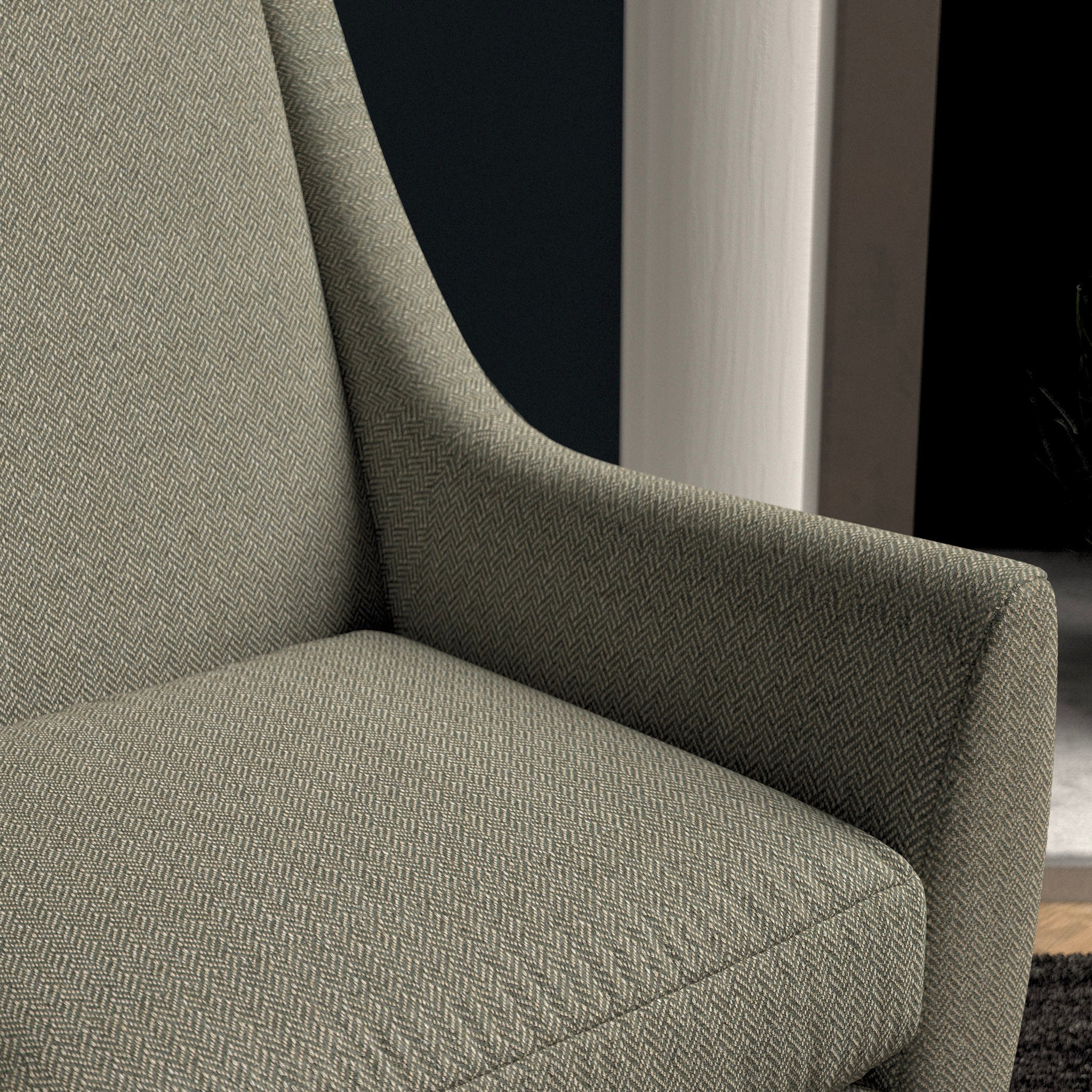 Chair upholstered in a dark grey herringbone wool weave upholstery fabric