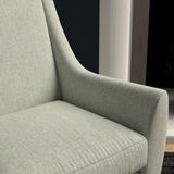 Chair upholstered in a light grey herringbone wool weave upholstery fabric