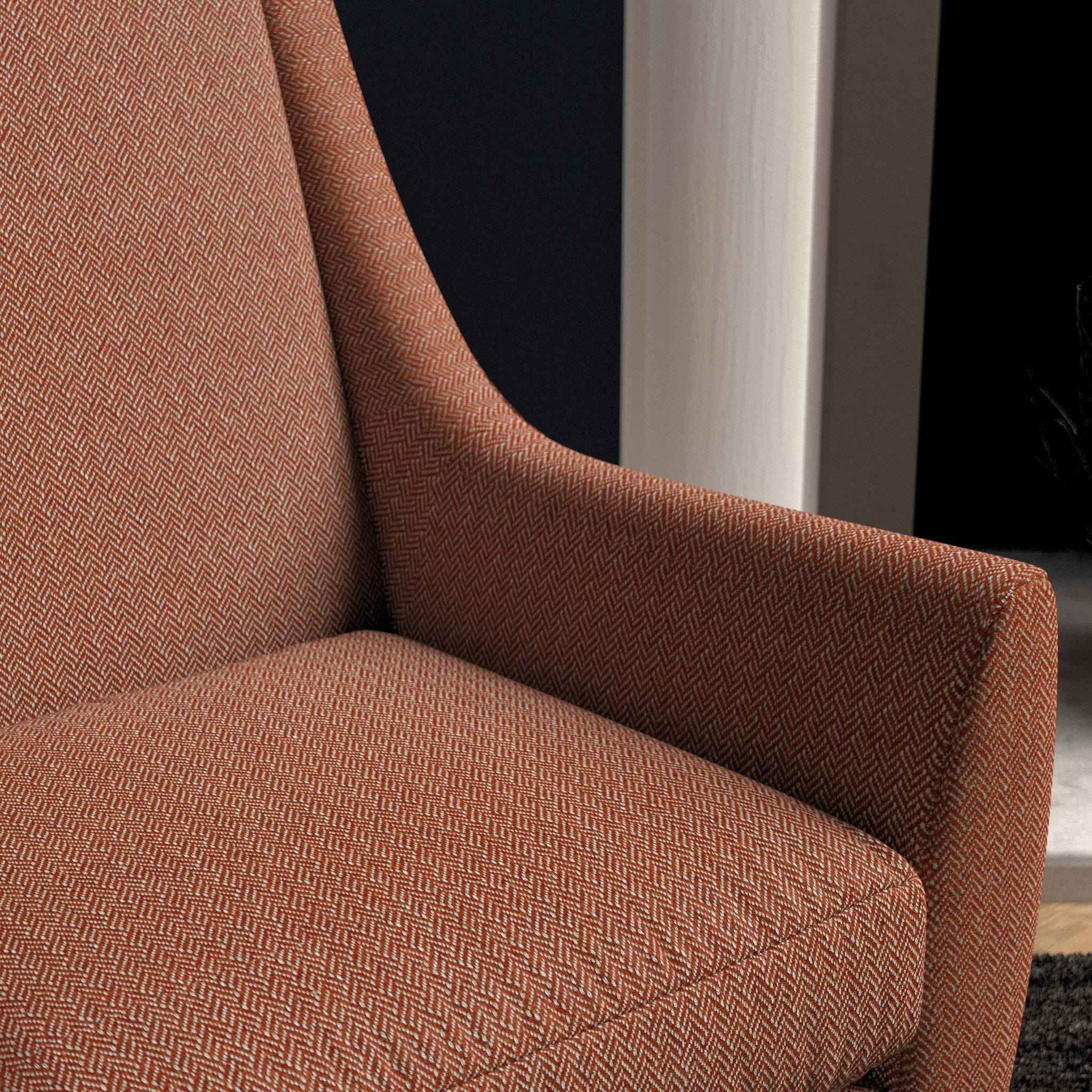 Chair upholstered in a orange herringbone wool weave upholstery fabric