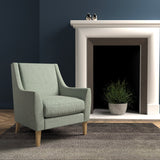 Chair in a light aqua herringbone wool upholstery fabric