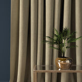 Curtain in a beige coloured herringbone wool fabric