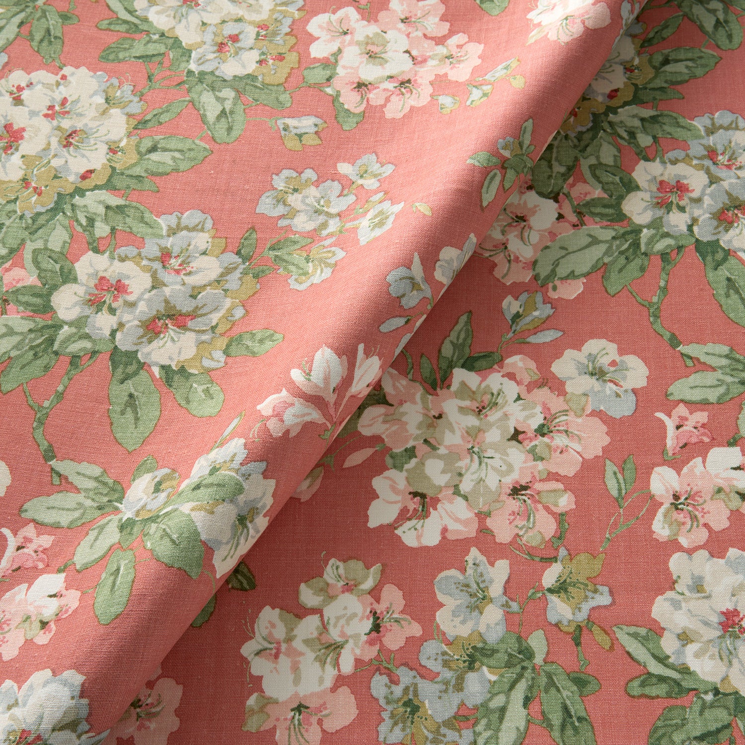Printed linen fabric with floral pattern in pink, green and white colours for linen curtains, blinds and upholstery.