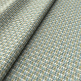 Printed linen fabric with textural weave pattern in blue and yellow colours for upholstery.
