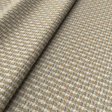 Printed linen fabric with textural weave pattern in beige colours for upholstery.