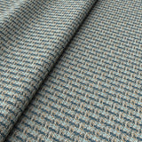 Printed linen fabric with textural weave pattern in blue colours for upholstery.