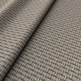 Printed linen fabric with textural weave pattern in green and pink colours for upholstery.