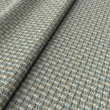 Printed linen fabric with textural weave pattern in brown and blue colours for upholstery.