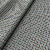 Printed linen fabric with textural weave pattern in brown, pink and blue colours for upholstery.