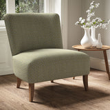 Armchair in a printed linen fabric with textural weave pattern in blue and yellow colours.
