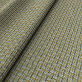 Printed linen fabric with textural weave pattern in yellow and blue colours for upholstery.