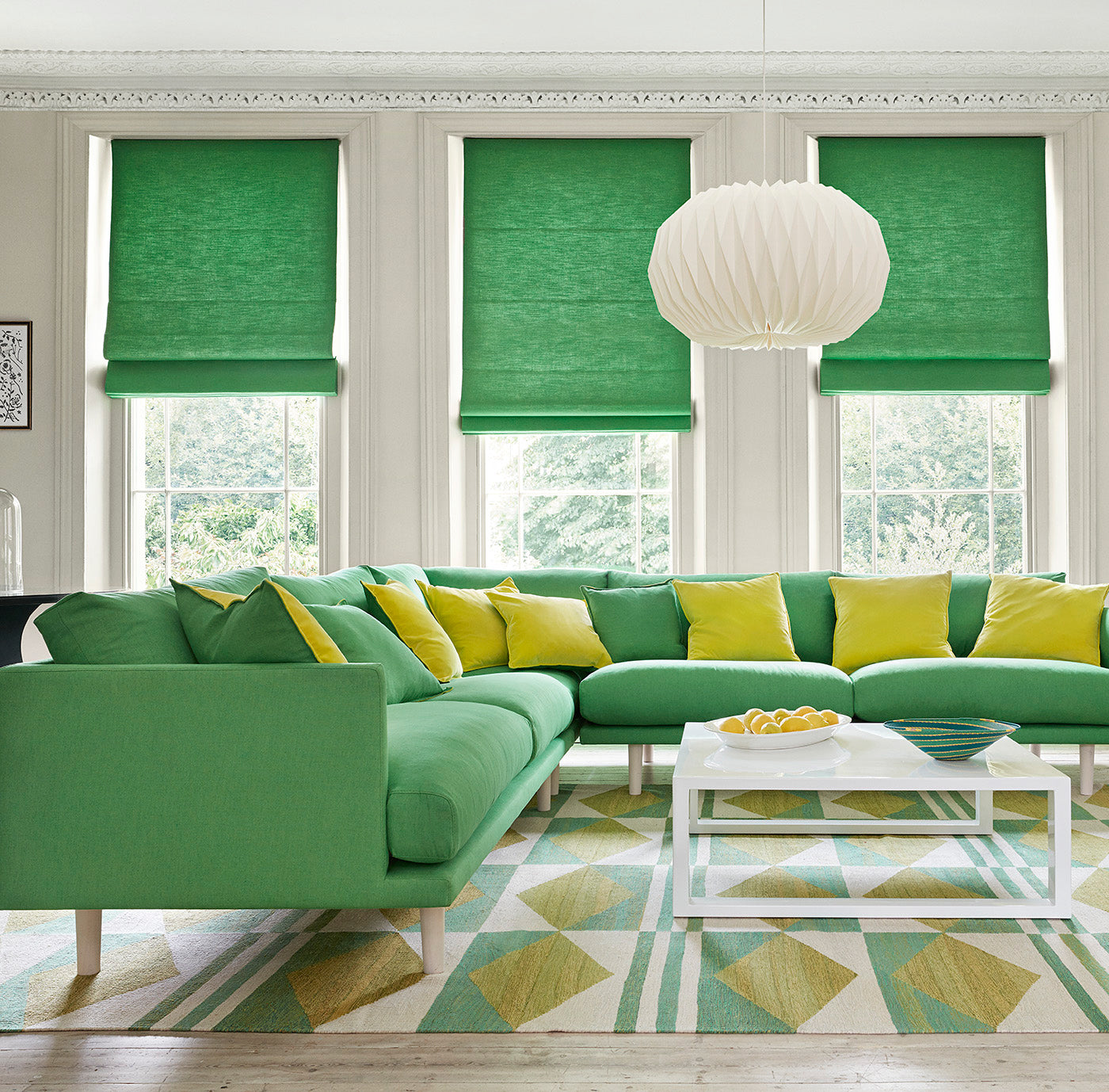 Sofa in yellow and green colours in Juno - a plain fabric.