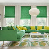 Sofa in yellow and green colours in Juno - a plain fabric.