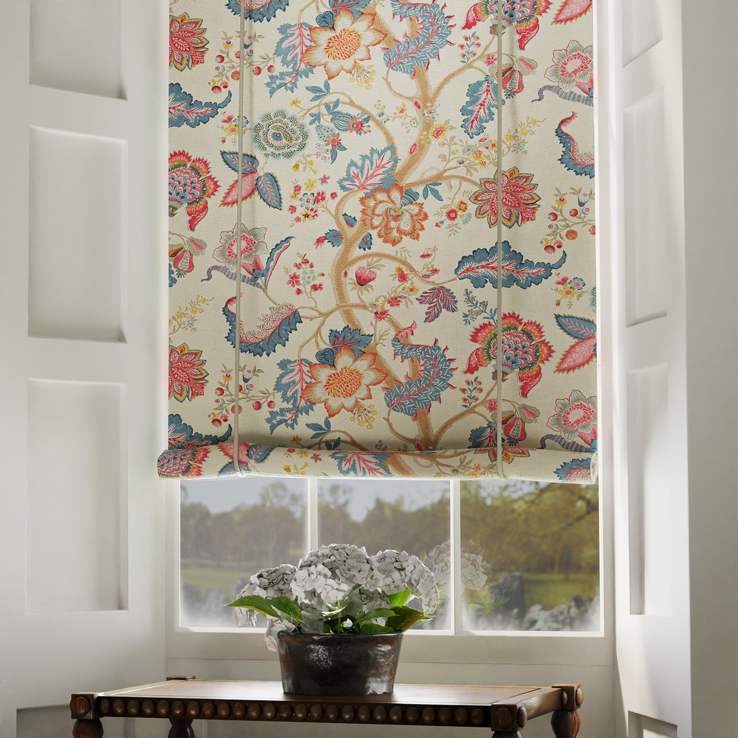 Blind in a printed linen fabric with tree of life design in multicolours.