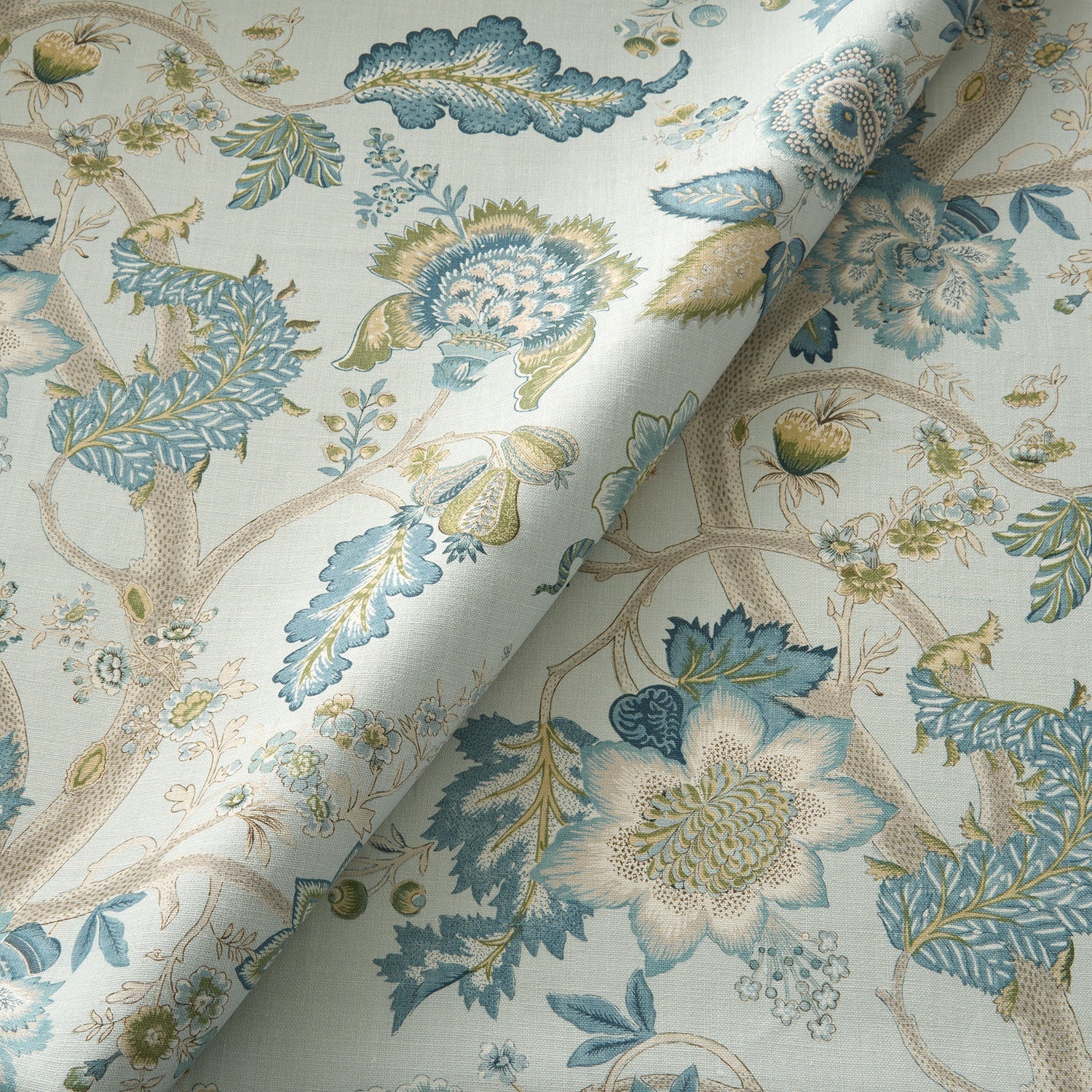 Printed linen fabric with Tree of Life pattern in blue and green.