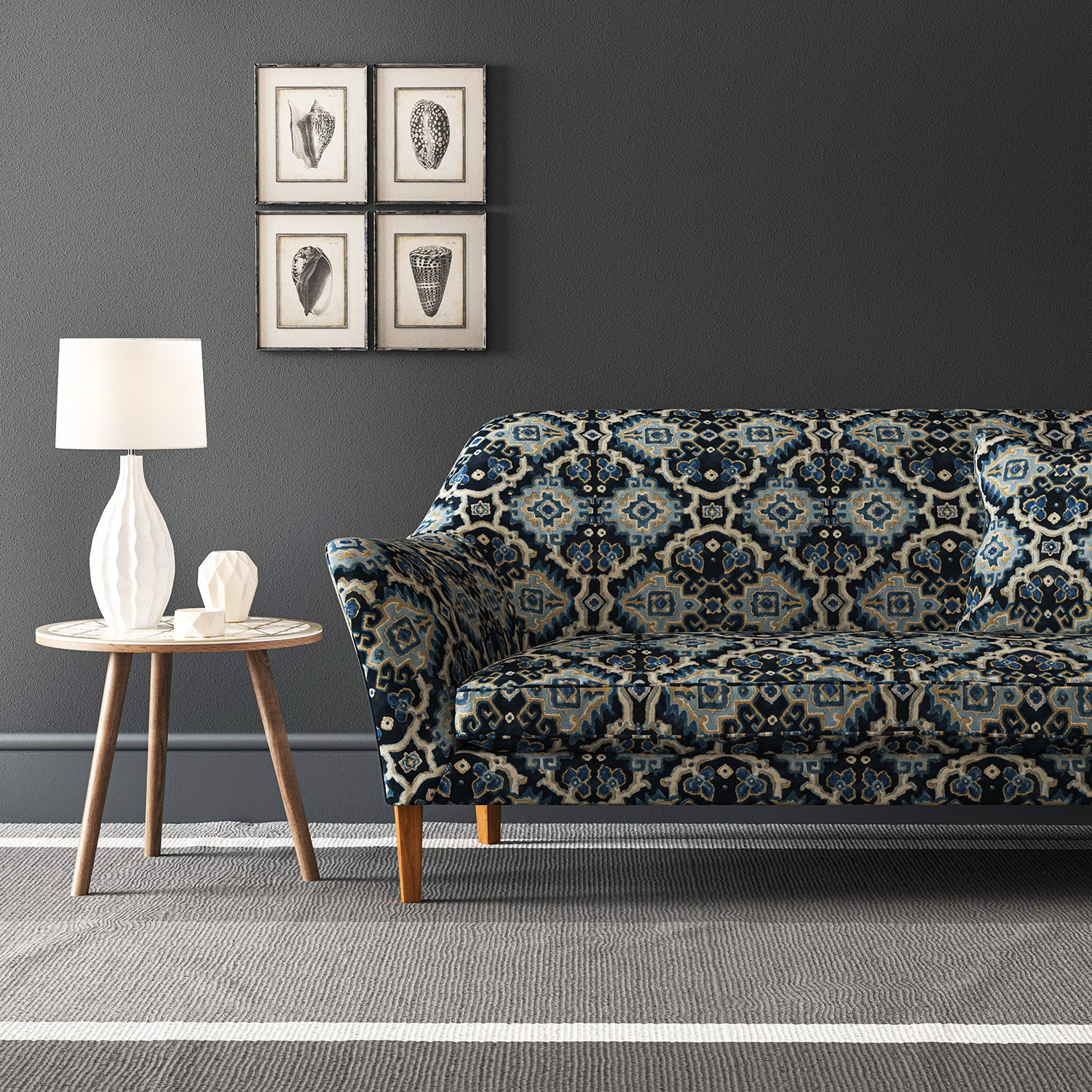 Velvet sofa upholstered in a printed velvet fabric with an oriental geometric design in blue colours