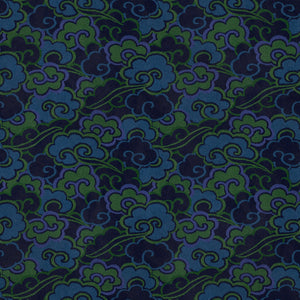 Printed velvet fabric with enchanting landscape of abstract clouds design in blue and green colours, for upholstery and curtain use.