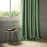 Curtains in a green Scottish wool plaid check fabric