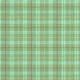 Fabric swatch of a green Scottish wool plaid check fabric for curtains and upholstery
