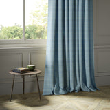Curtains in a blue Scottish wool plaid check fabric
